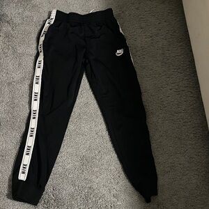 Nike Kids Black Sweatpants with Logo Stripes